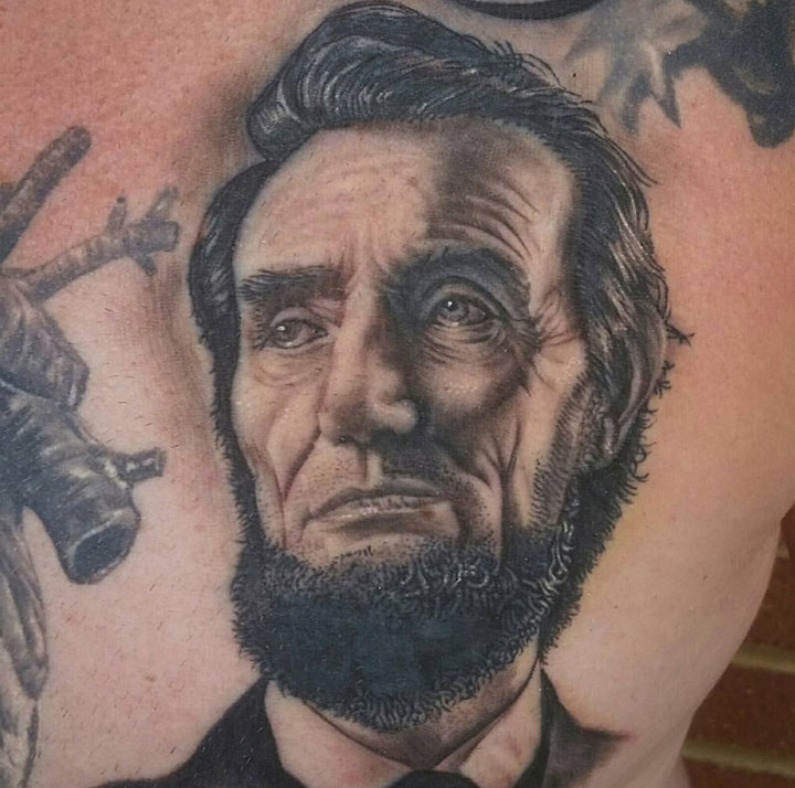 My Abraham Lincoln tattoo that I paid 20 forI kinda wanna get the rest of  his body  rshittytattoos
